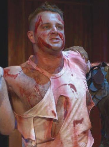 bloody man wrestling event fighting bloodied face carolina jim
