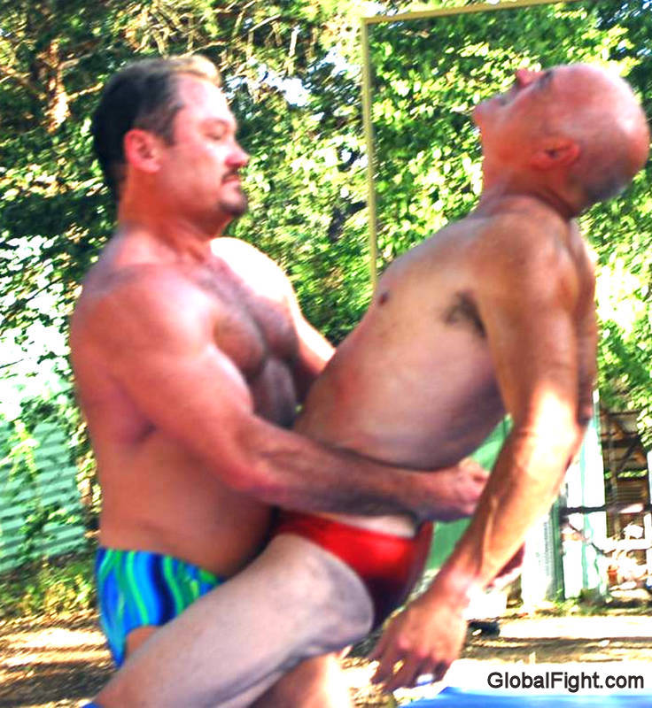 backyard bearhugging older men