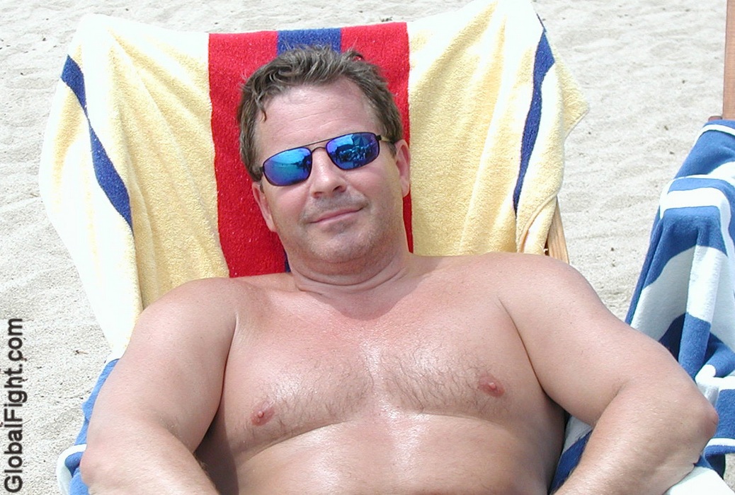 beach hot guy man soaking up rays tanning sun