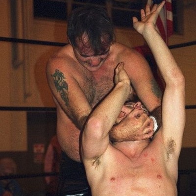 young twinks fighting and wrestling shirtless sweaty in pro wrestling ring