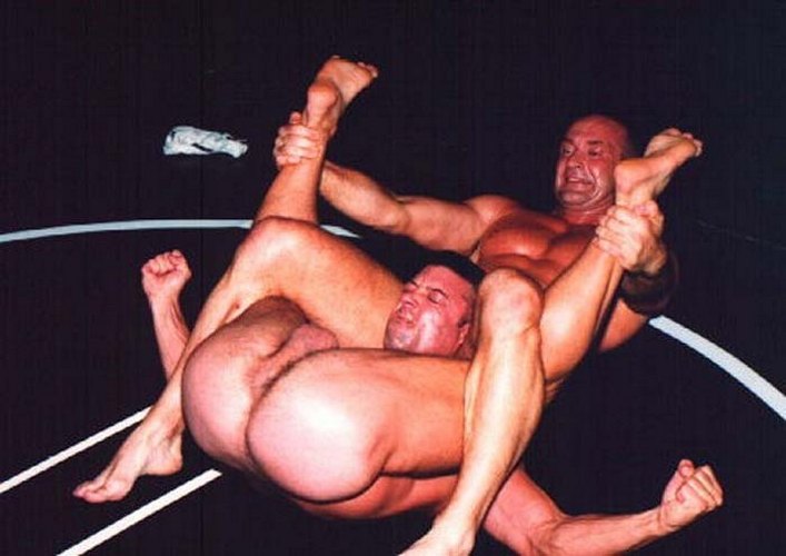 wrestling man ass stretching gay fag opponent.