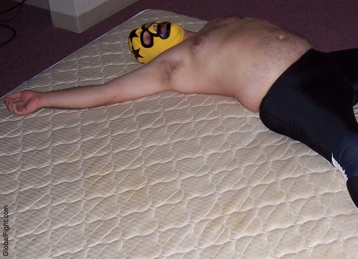 wrestling man sleeping asleep hotel room wrestler bear